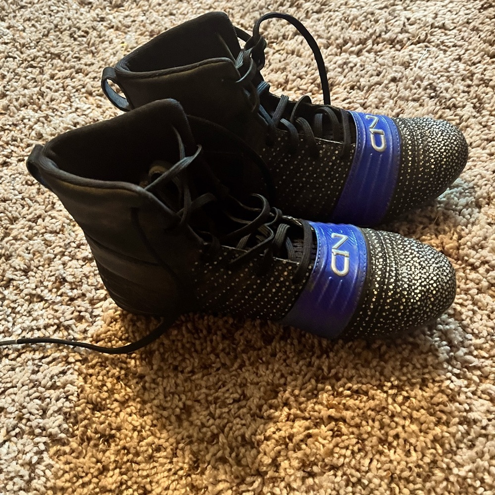 C1N youth football cleats by Cam Newton